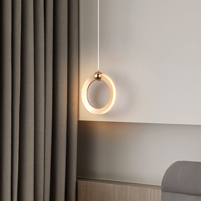 Modern pendant light with hanging rings